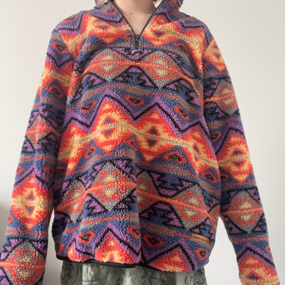 Simply southern pull over. Mainly orange and purple with pop of other colors :)